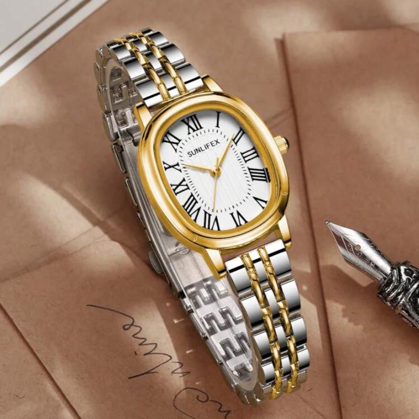 Gold And Silver Watch With Roman Numerals Gold And Silver Watch With Roman Numerals